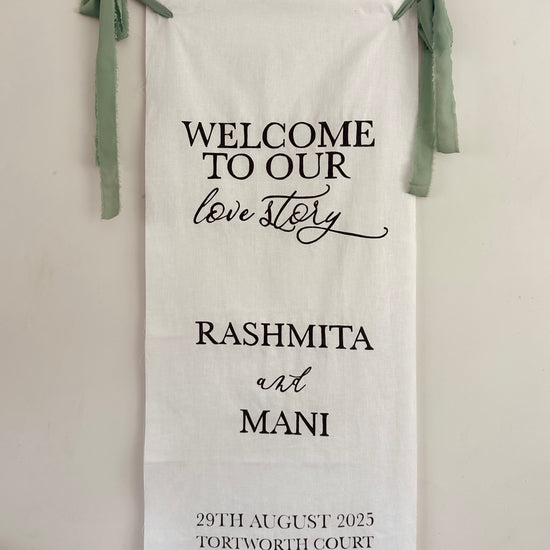 Handcrafted linen wedding welcome sign with personalised text in black lettering